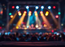 Geolier in concerto, simbolo del rap italiano contemporaneo